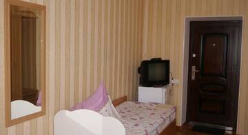 Четырехместный номер эконом-класса с общей ванной комнатой в Гостинице «Гостинный Двор»